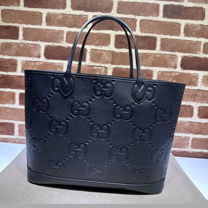 G*u*i shopping bags